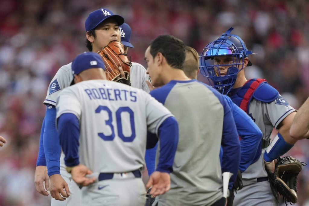 Dodgers’ Shohei Ohtani exits start early, remains in game at DH