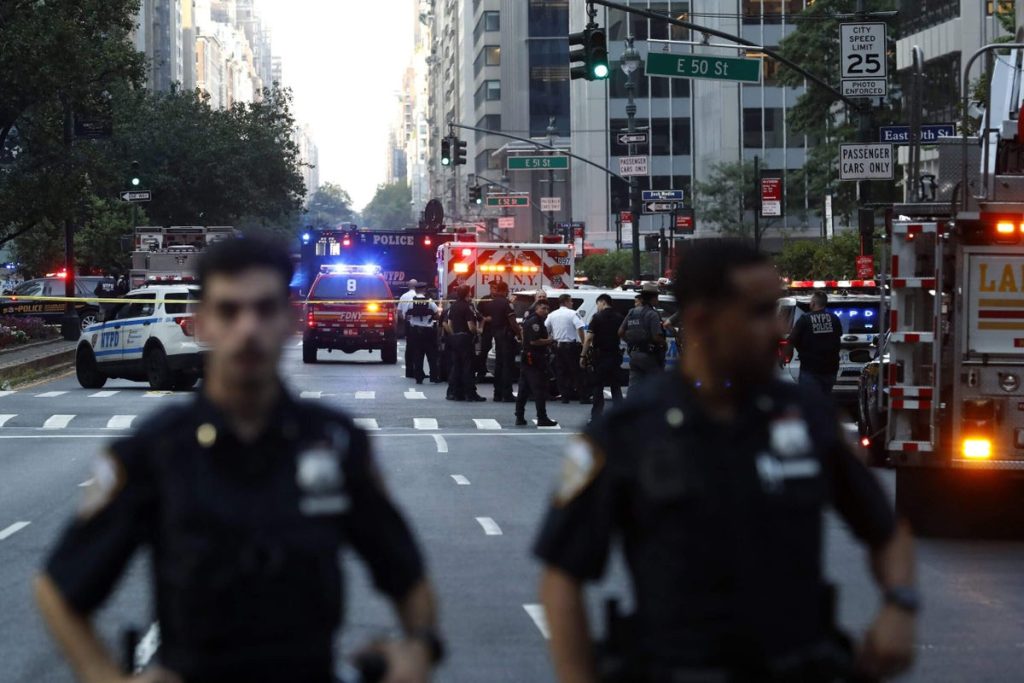 Four killed in shooting at building housing NFL headquarters, one league employee injured