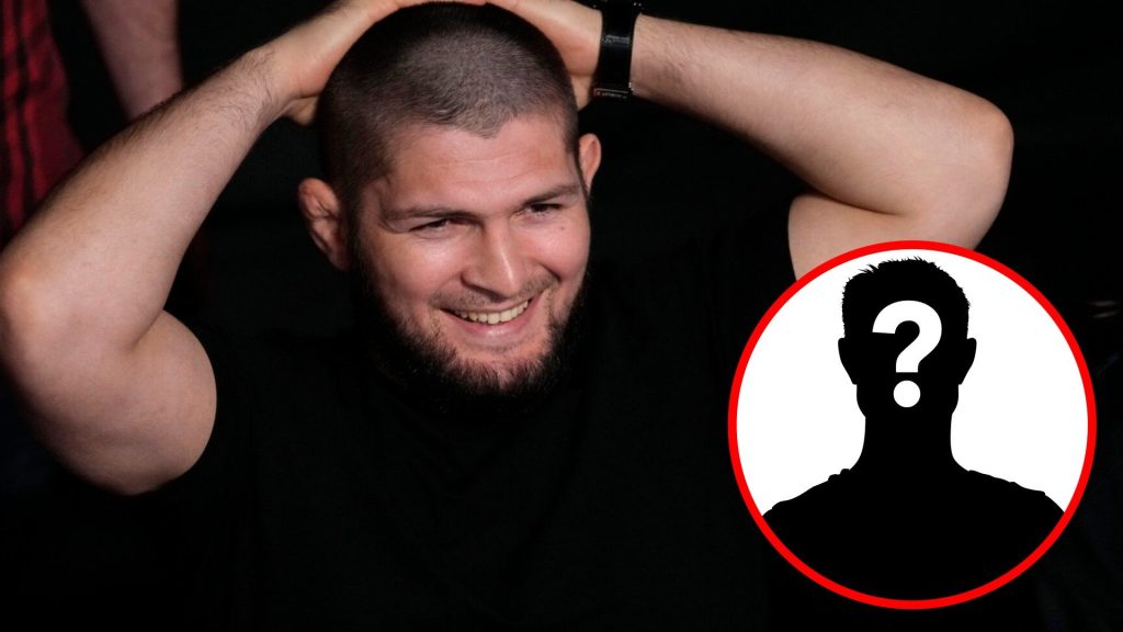 Khabib Nurmagomedov smiles while being in attendance at the UFC Apex in 2022, inset mystery icon