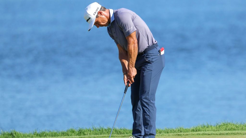 Thorbjorn Oleson putts on the eighteenth green during the third round of the 3M Open