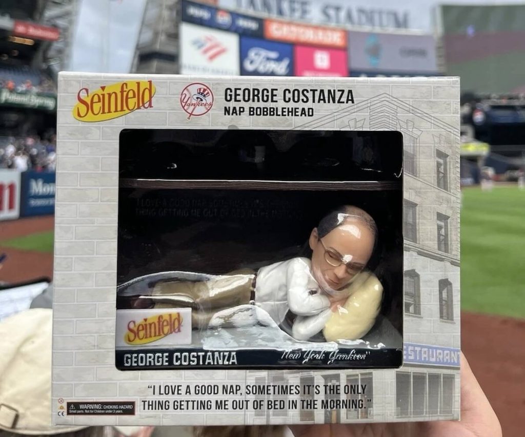 Yankees fans wait in line for hours to get napping George Costanza bobblehead