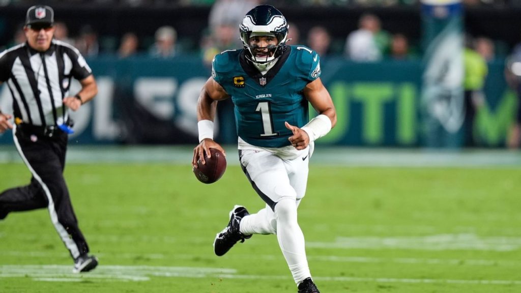 Banner day for Eagles as champs hold off Cowboys in wild one Banner day for Eagles as champs hold off Cowboys in wild one