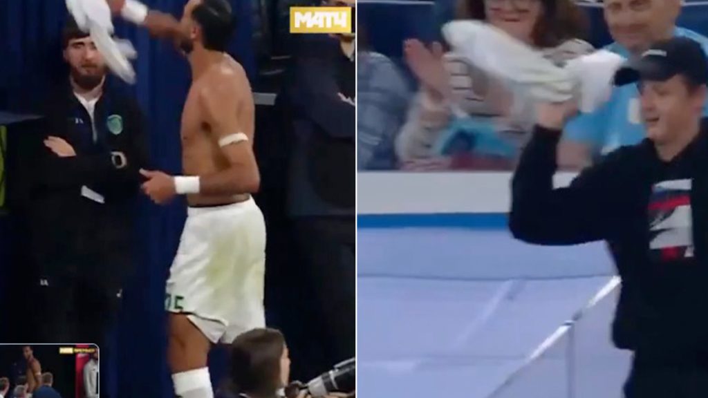 Fuming footie star throws shirt at fan after being sent off - then has to beg for it back as VAR intervenes