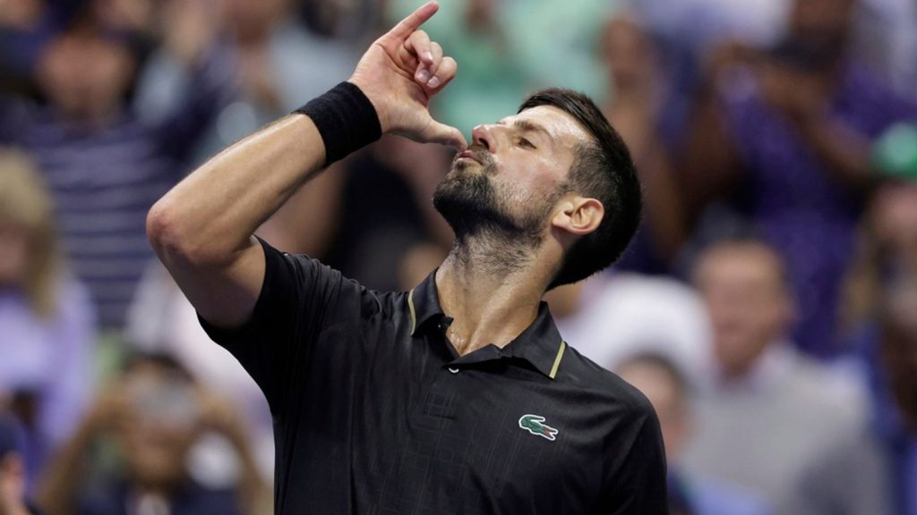 Novak Djokovic, of Serbia, reacts after defeating Taylor Fritz, of the United States, during the quarterfinal round of the U.S. Open tennis