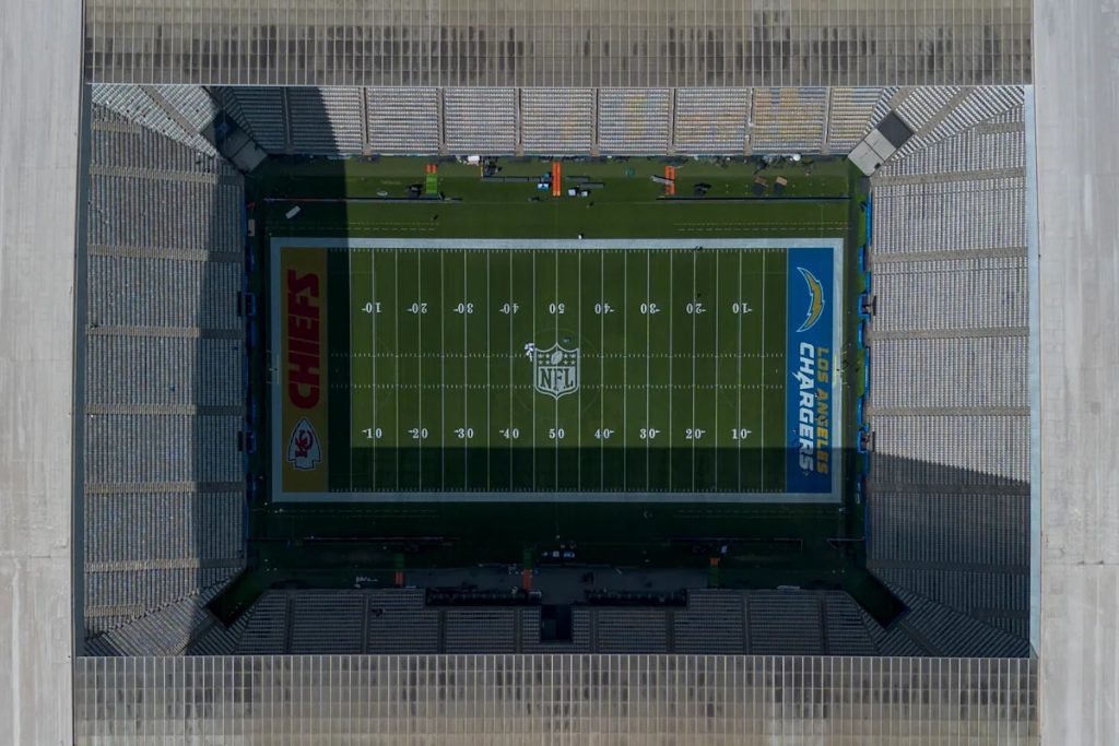 Why do the Kansas City Chiefs have their logo in an end zone as the away team vs. Los Angeles Chargers in Brazil? Download app from appStore