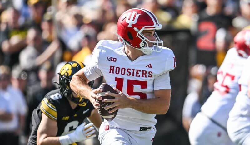 Indiana vs Oregon Prop Picks & Best Bets for College Football Week 7 Indiana Hoosiers quarterback Fernando Mendoza (15) rolls out to throw a pass.