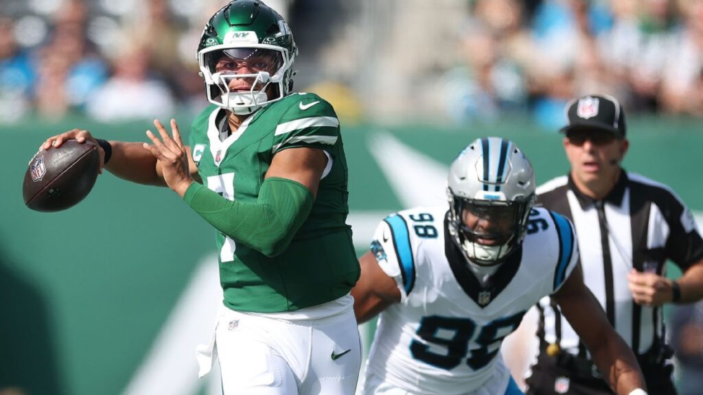 Justin Fields shrugs off Jets owner Woody Johnson’s criticism Justin Fields shrugs off Jets owner Woody Johnson's criticism