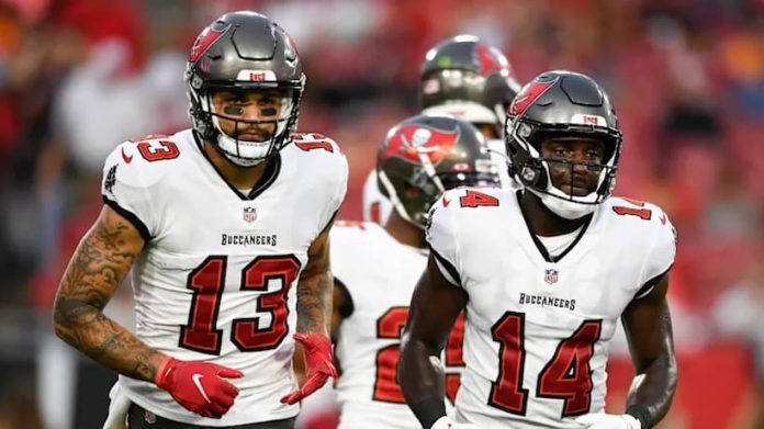The Buccaneers will be without Mike Evans and Chris Godwin in Week 6 Mike Evans and Chris Godwin Bucs pic