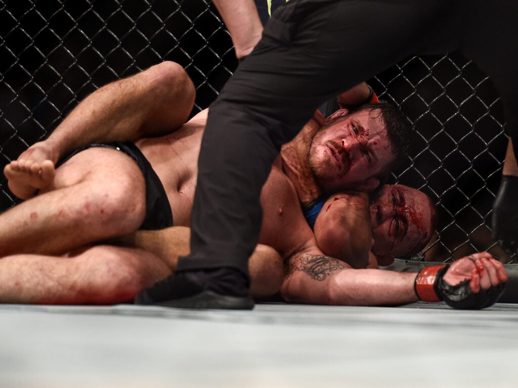 Dana White may have regretted breaking golden rule after Georges St-Pierre’s UFC comeback title win Georges St-Pierre locks in a rear-naked choke against Michael Bisping