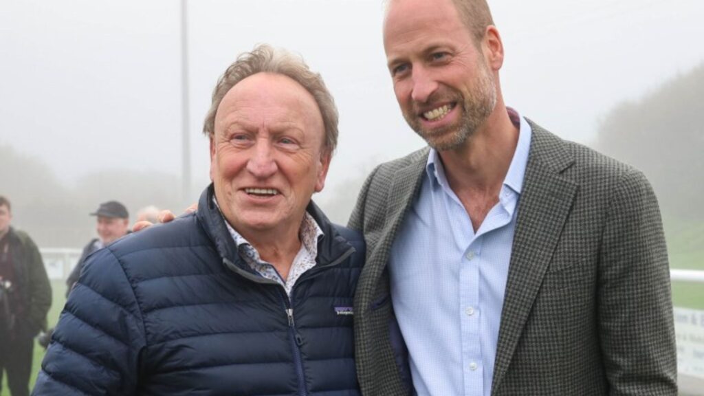 Football legend Neil Warnock poses for a photo with ‘fan’ Prince William after royal helped stranded local football club Football legend Neil Warnock poses for a photo with 'fan' Prince William after royal helped stranded local football club