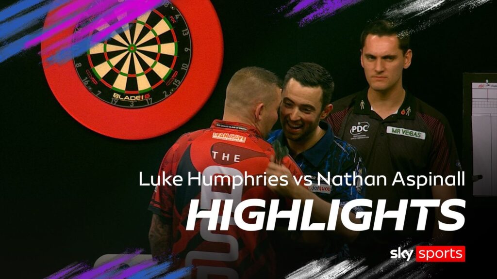 Highlights of the Grand Slam of Darts group stage game between Luke Humphries and Nathan Aspinall.