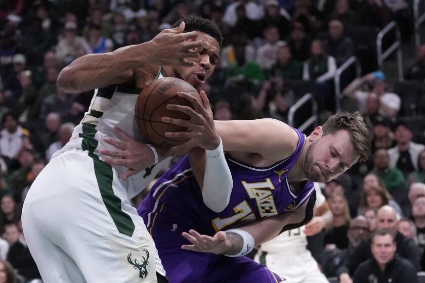 Luka Doncic scores 41 as Lakers rout Milwaukee Bucks to cap 3-2 trip Download app from appStore