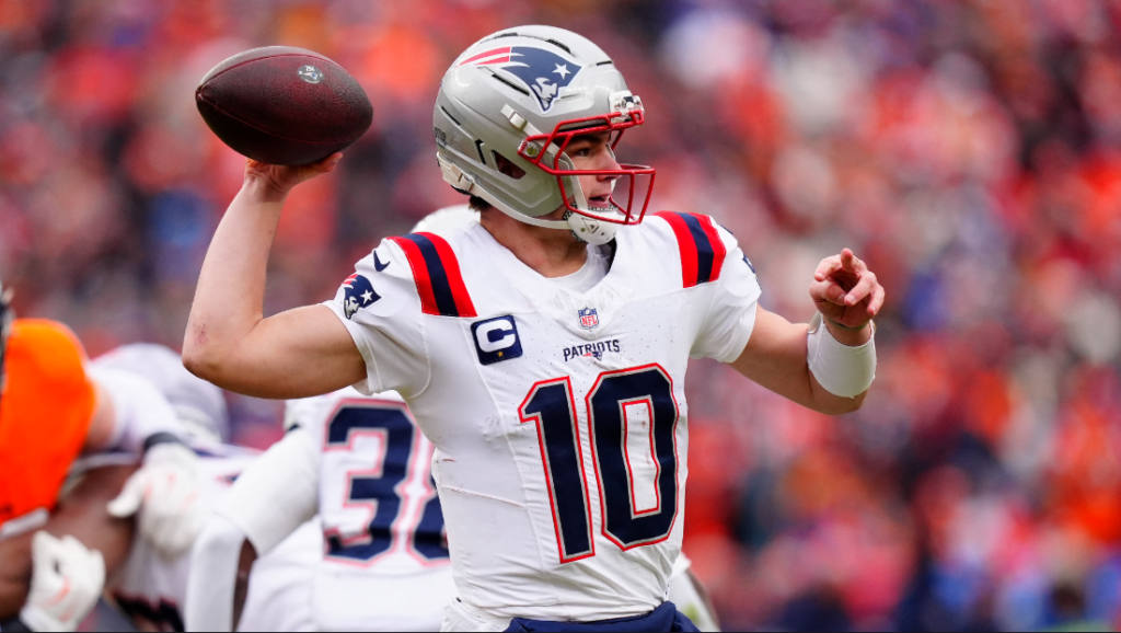 New England Patriots quarterback Drake Maye (10) drops back to pass against the Denver Broncos during the first half in the 2026 AFC Championship Game at Empower Field at Mile High.