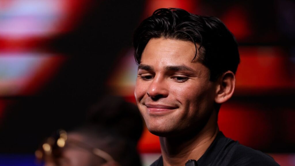 Ryan Garcia smiles at the press conference for his fight with Mario Barrios.