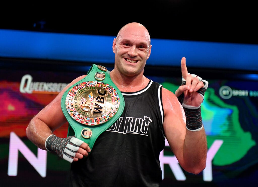 Tyson Fury’s undefeated brother booed after controversial KO as his family celebrate at ringside Tyson Fury with a WBC belt
