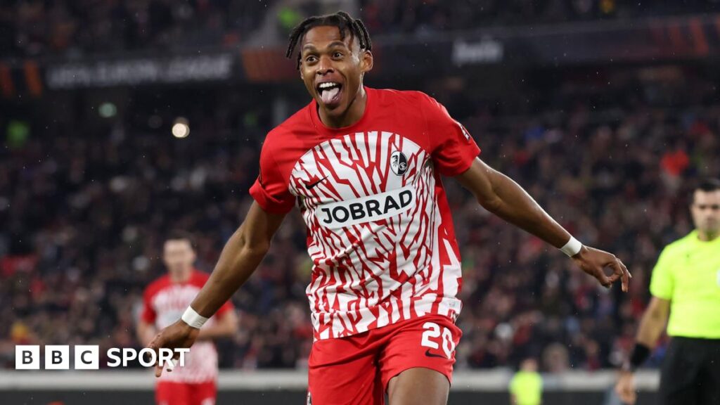Junior Adamu celebrates after scoring for Freiburg