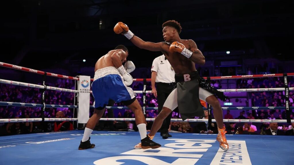 Jadier Herrera lands a right hand during his WBC interim lightweight title fight.