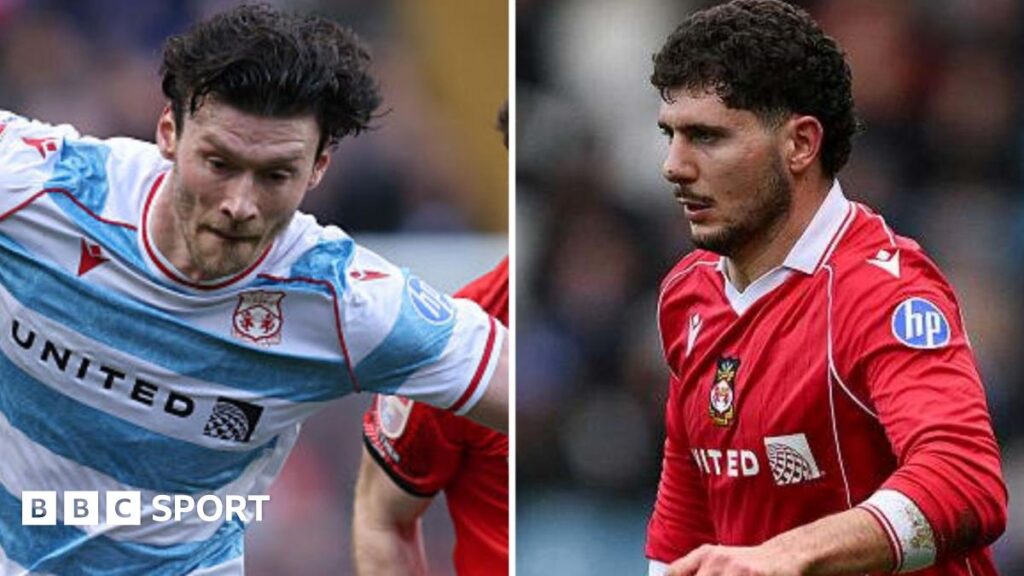 Kieffer Moore (L) and  Liberato Cacace in action for Wrexham