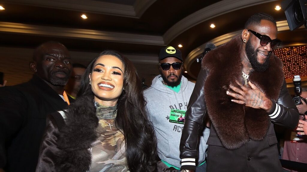 Deontay Wilder Vehemently Denies Lawsuit Claims He Battered a Minor For Years Deontay Wilder arrives with former fiancée Telli Swift at a boxing event