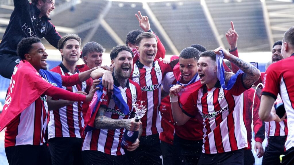 Lincoln City promoted to Championship after 65-year absence Copy Link