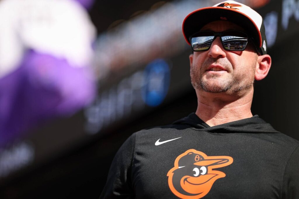 Orioles manager Craig Albernaz hit in head by foul ball, returns to dugout with red mark Orioles manager Craig Albernaz hit in head by foul ball, returns to dugout with red mark