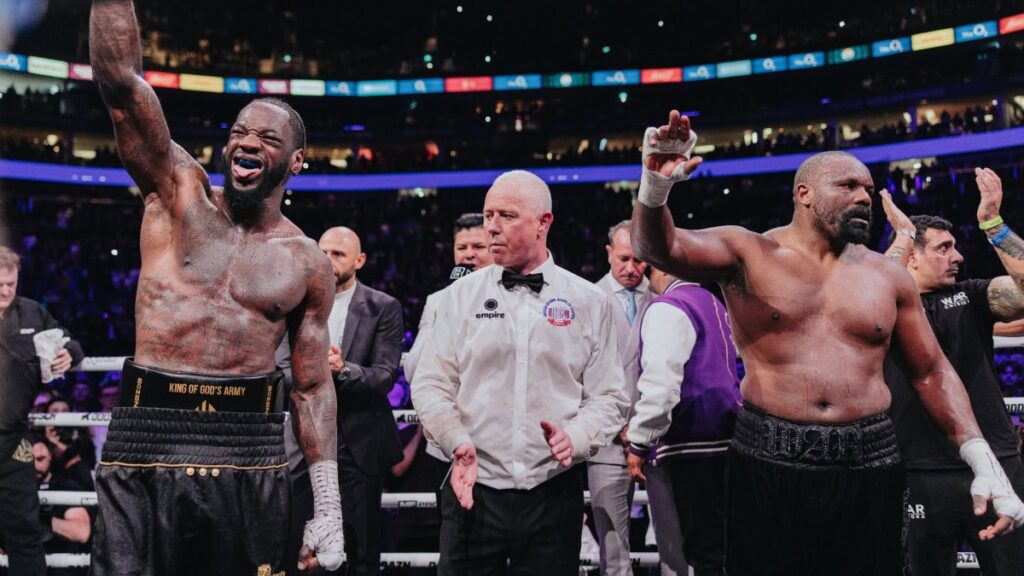 UK Boxing Officiating Under Fire After Another Controversial Weekend Deontay Wilder celebrates victory over Derek Chisora as referee Mark Bates stands between the fighters at the O2 Arena in London