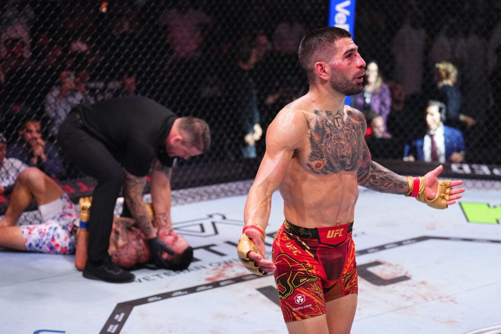 Michael Bisping won’t rule out Ilia Topuria ‘breaking’ Justin Gaethje’s jaw in the first 15 seconds Ilia Topuria walks away from Max Holloway after knocking him out at UFC 308