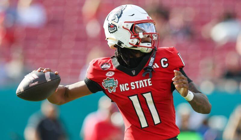 Early Picks & Odds for Week 0 NC State Wolfpack quarterback CJ Bailey (11) throws a pass.