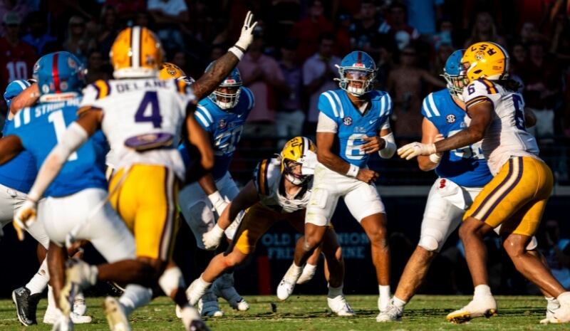 College Football Week 3 Over/Under Picks Today Ole Miss quarterback Trinidad Chambliss (6) passes the ball.